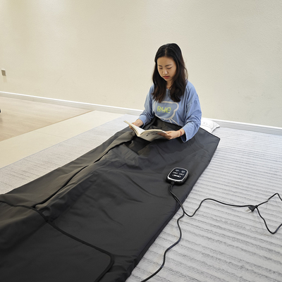 Couverture de sauna réutilisable à dose plus élevée électrique portable et tension 110V-240V pour maigrir