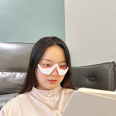 Massageur oculaire à lumière rouge à LED 3D pour éliminer les poches oculaires et les cernes