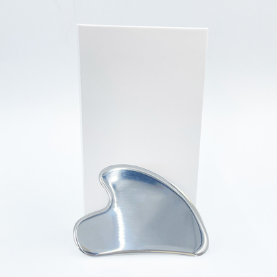 Massage du visage en acier inoxydable vert Gua Sha Stone pour le cou et le visage Logo personnalisé beauté