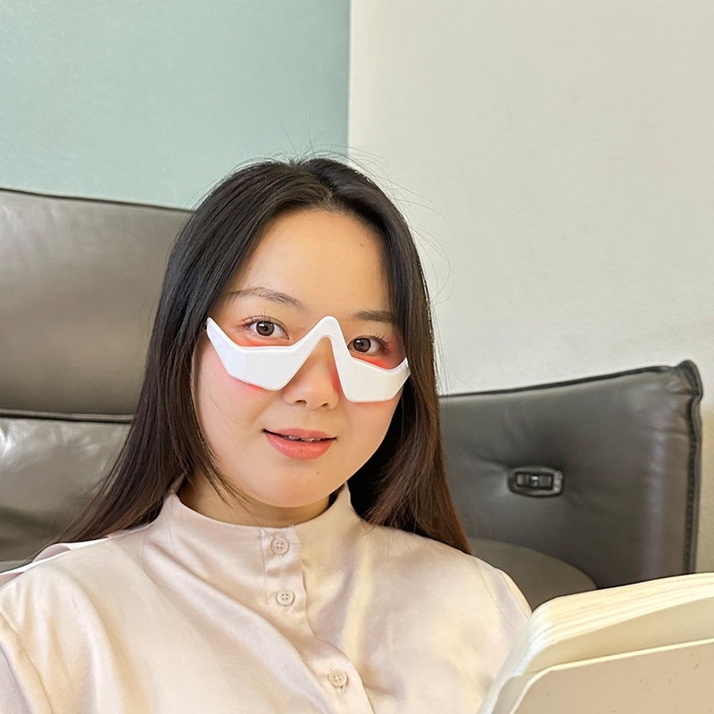 2024 Appareil thérapeutique à lumière rouge Anti-âge Micro-courant Ems Massageur oculaire pour les soins oculaires